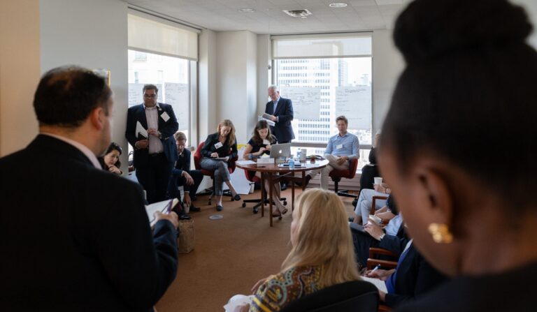 people inside of a boardroom