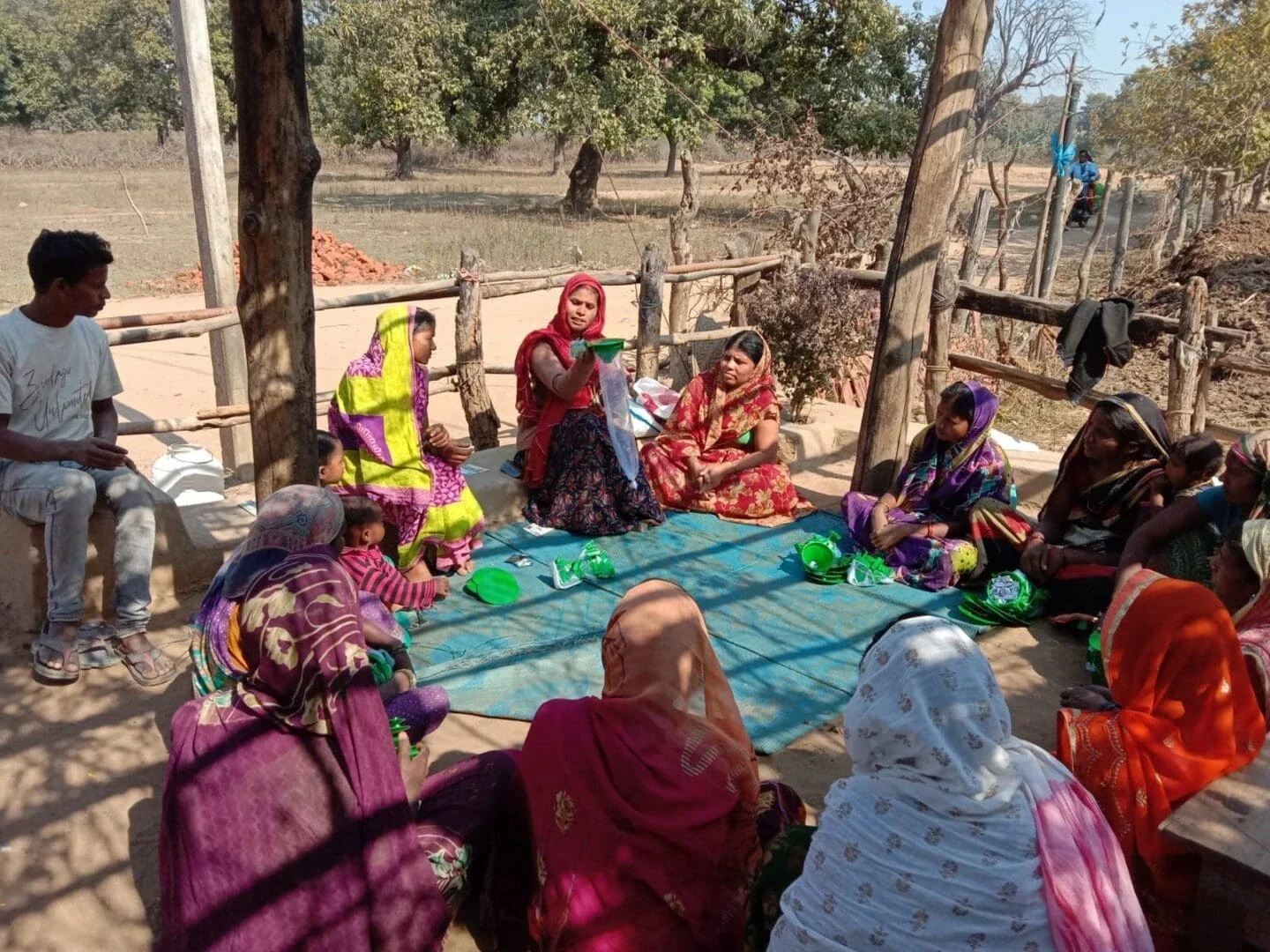 Women farmers gather in the heat of the day for a training session in Bihar, India