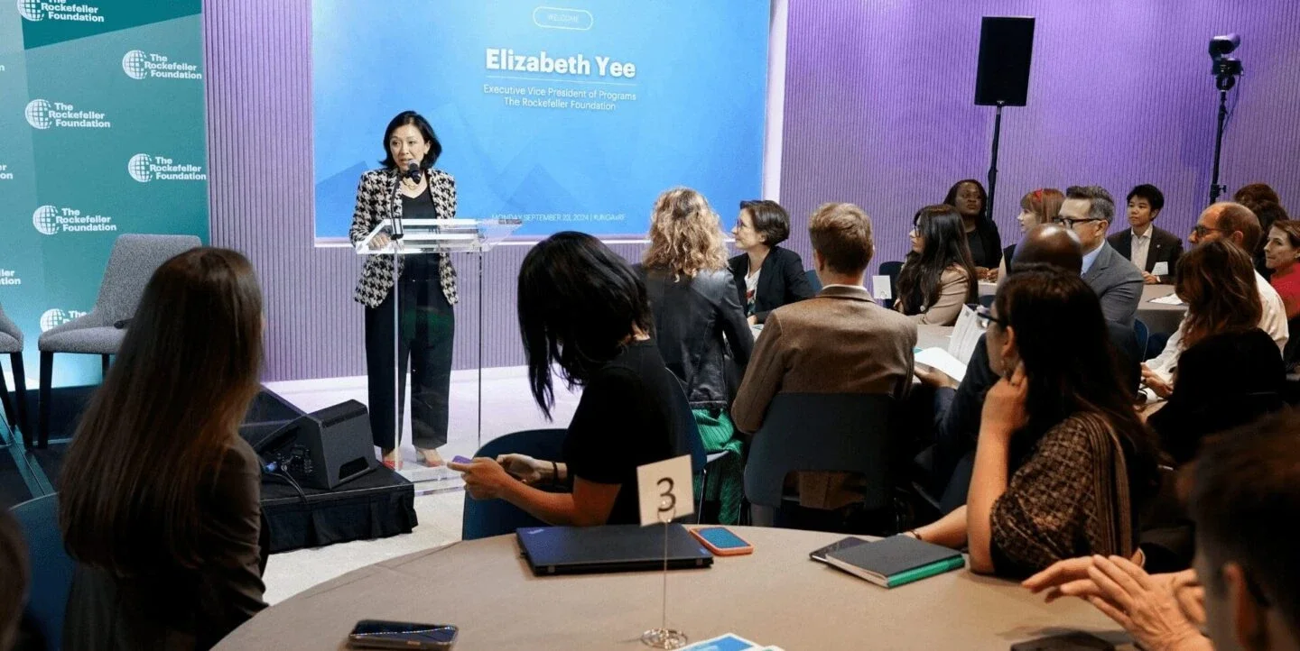 Executive Vice President Elizabeth Yee addresses a gathering at The Rockefeller Foundation headquarters during UNGA's Climate Week